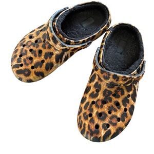 Crocs animal print with furry inside.